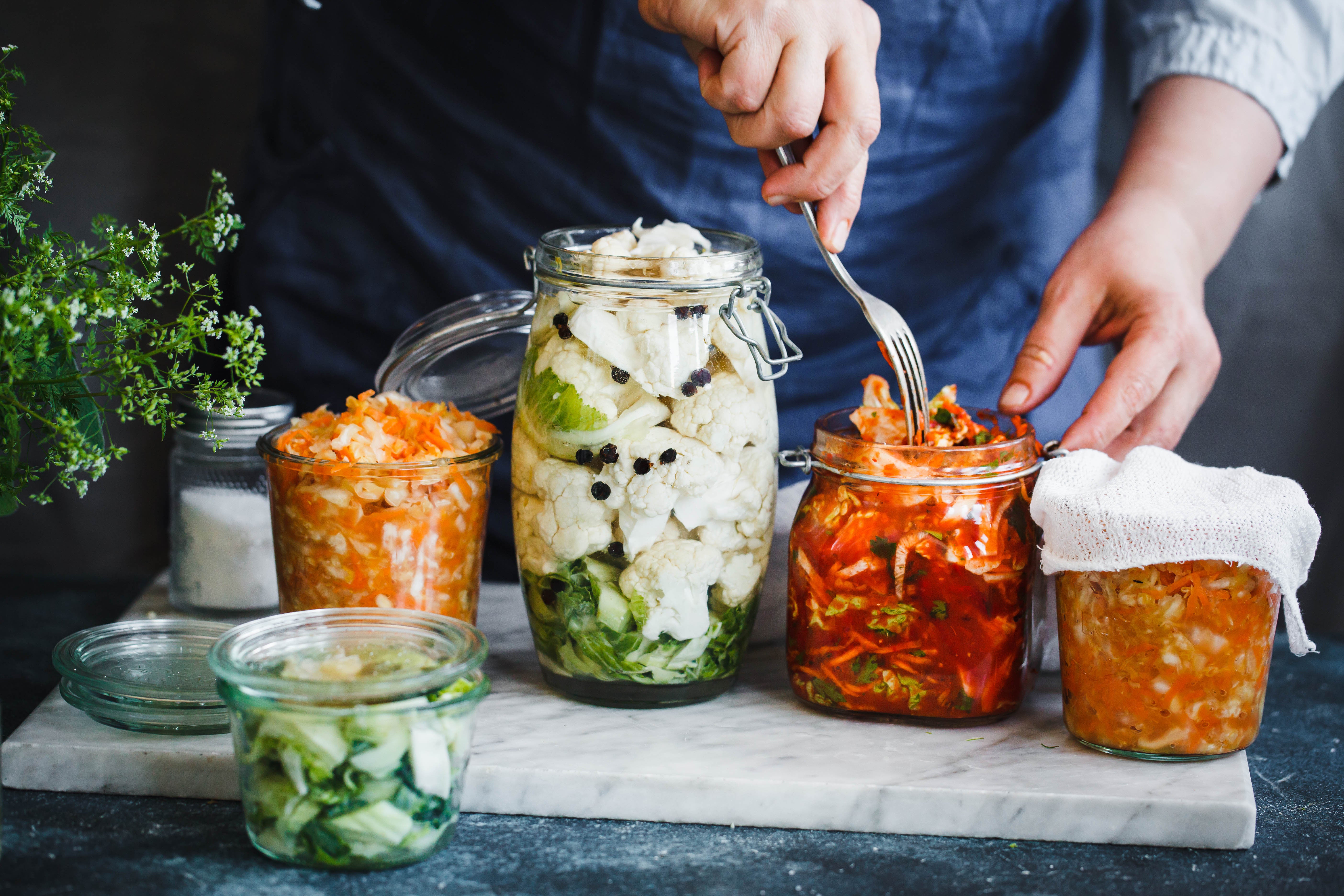 Fermented foods being prepared by a chef